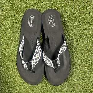 Brand new! Coach Monogram Black and White Sandals.